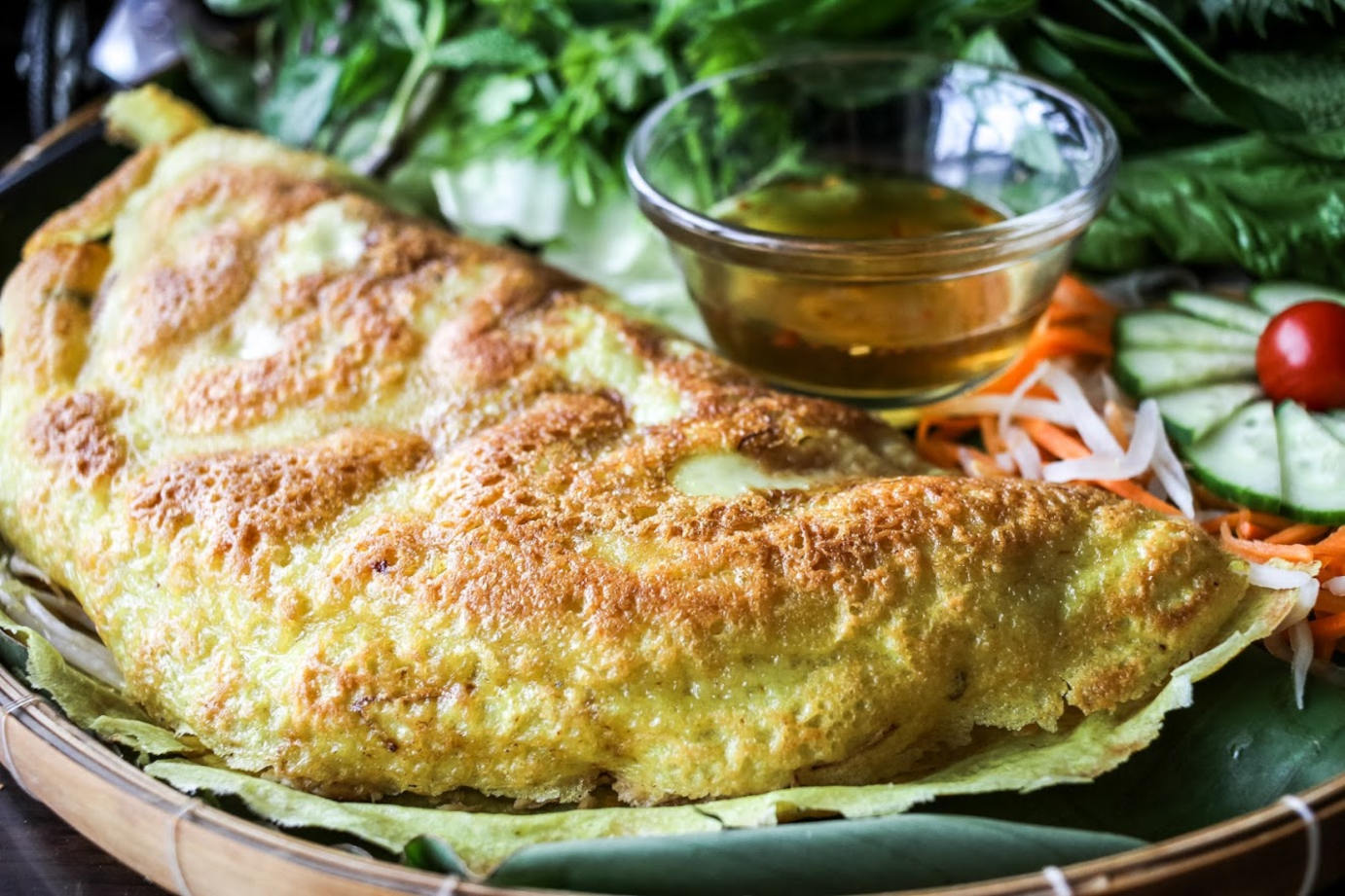 Pastry with meat, green salad on the side