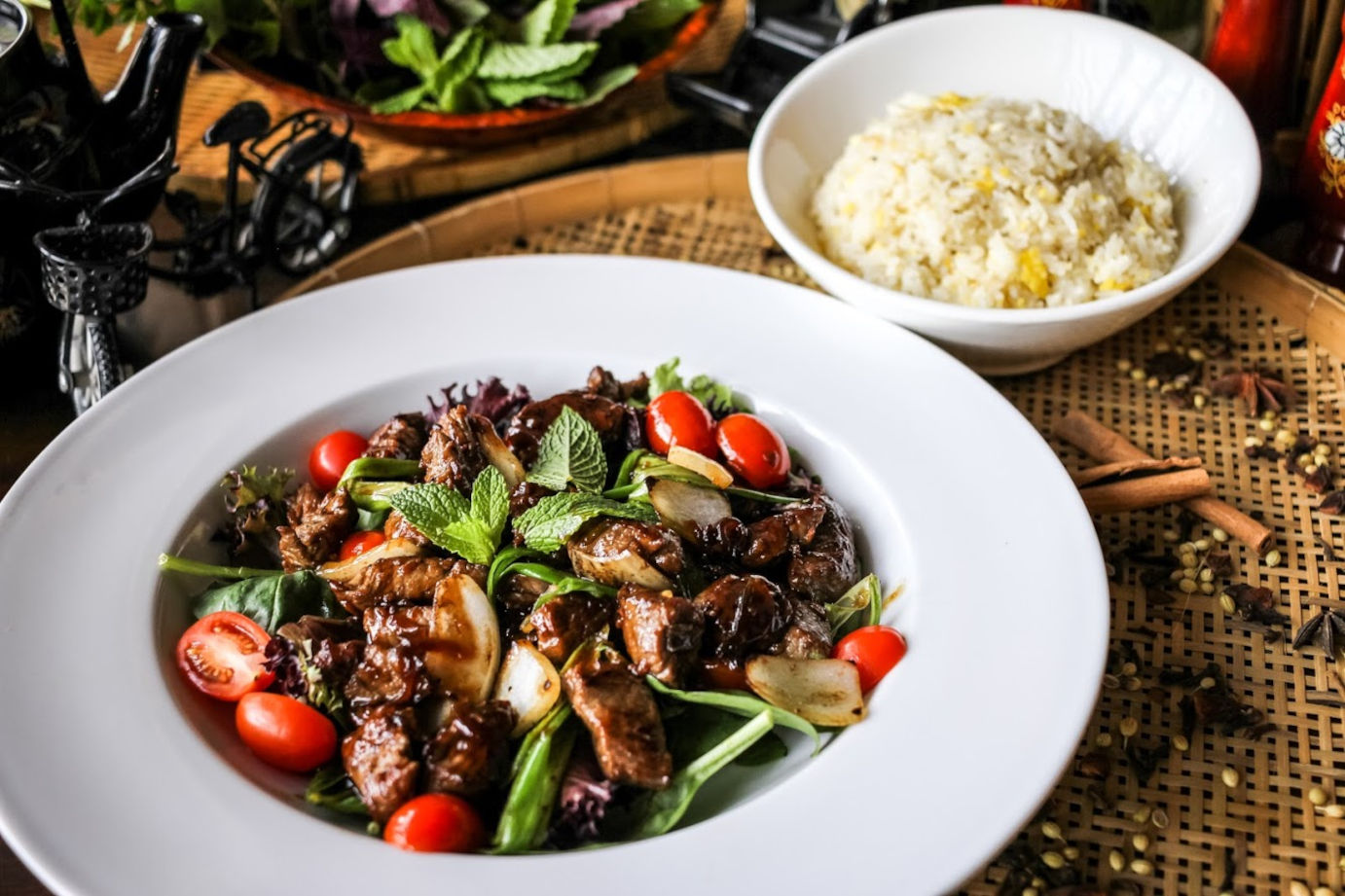 Grilled meat with cherry tomato, rice on the side