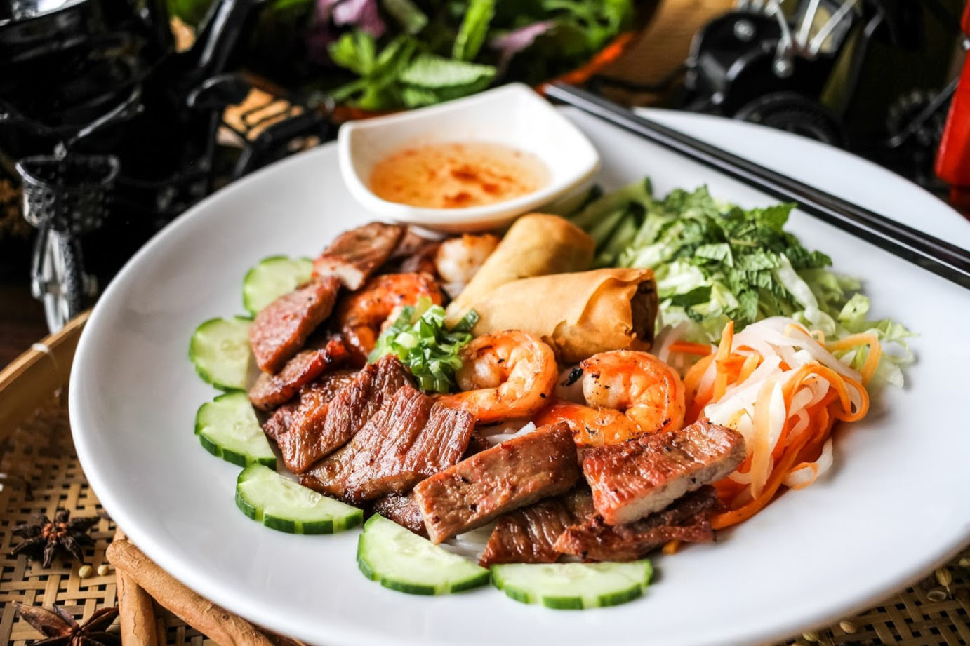 Grilled meat, shrimps, pastry and salad on the side